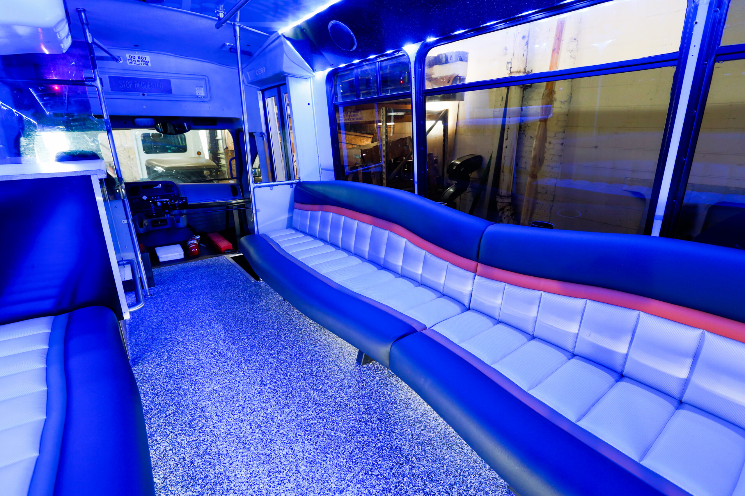 St. Louis quinceanera party bus interior with LED lighting and wrap-around seating