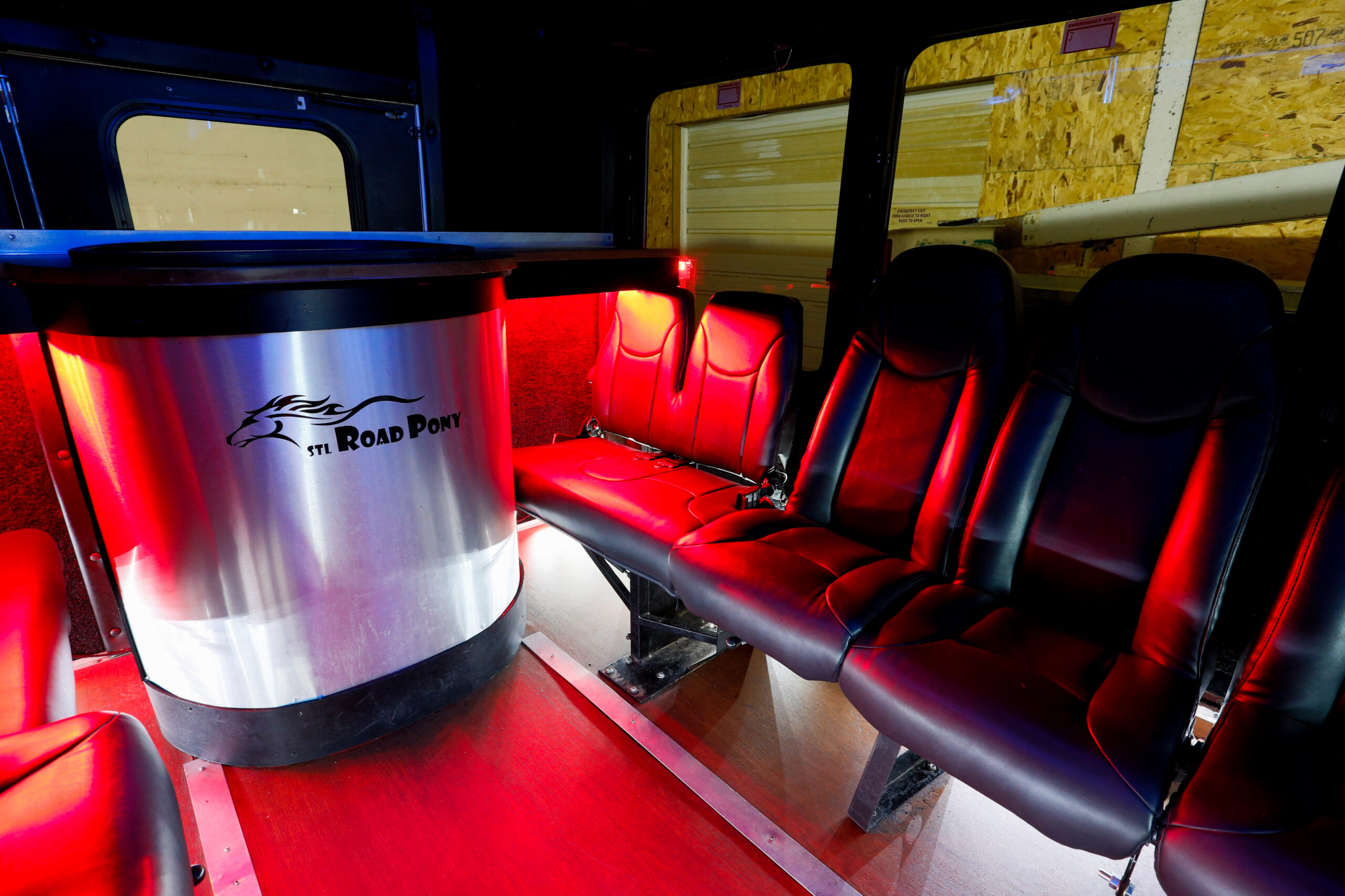 St. Louis prom party bus interior with LED lighting and wrap-around seating